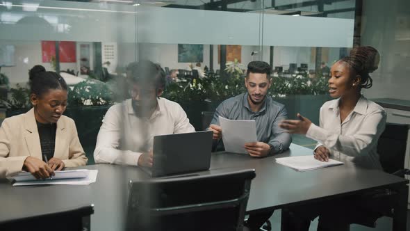 Motivated African Female Team Leader Explaining Company Development Strategy Diverse Colleagues in alt