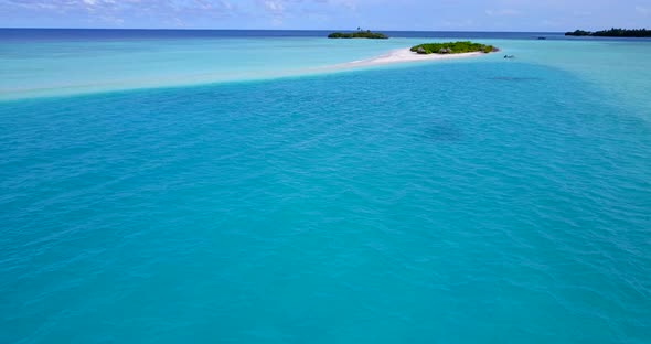 Wide angle fly over abstract view of a paradise sunny white sand beach and blue sea background in hi alt