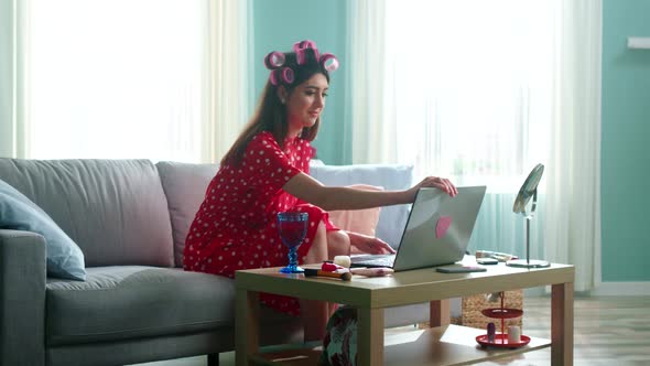 Woman Blogger Opens Laptop To Make Video Call alt