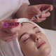 Cosmetologist Makes the Microdermabrasion Procedure of the Face Skin in a Beauty Salon - VideoHive Item for Sale