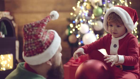 Little Son with Father. Merry Christmas and Happy New Year alt