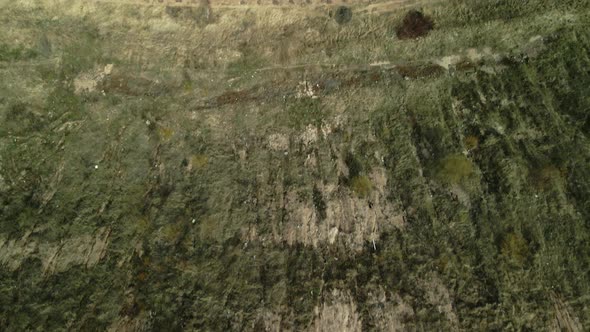 Conserved landfill for household waste. A mound of rubbish. Aerial photography. alt