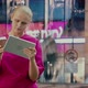 Timelapse of Woman with Touch Pad in Crowded Street - VideoHive Item for Sale