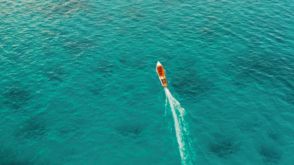 Seascape, Coral Reef and Blue Sea with Motorboat. Balabac, Palawan, Philippines alt
