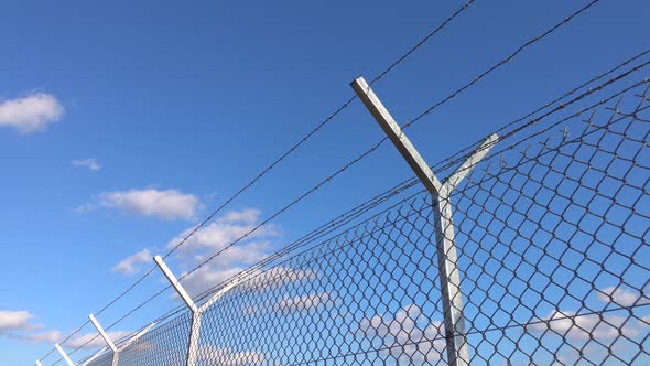Fence & Clouds 4K alt