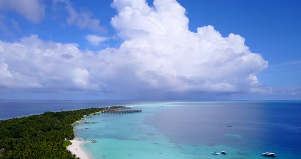 Tropical aerial clean view of a white sandy paradise beach and turquoise sea background in colourful alt