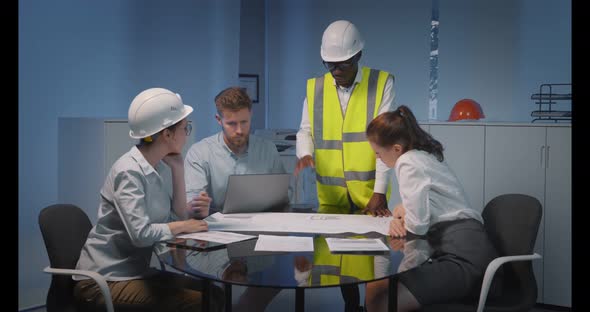 Professional Engineer Team Meeting and Working on Project at Modern Office alt