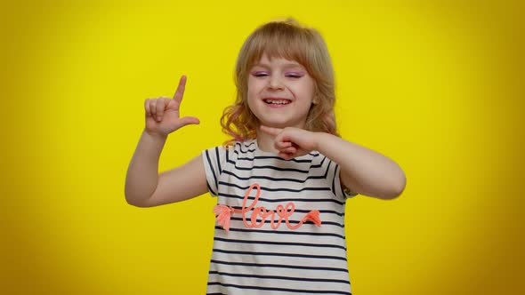 Child Girl Showing Loser Gesture and Pointing on you Blaming Accusing for Unsuccess Bullying Abuse alt