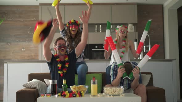 Fans Cheering Teams of Germany and Italy