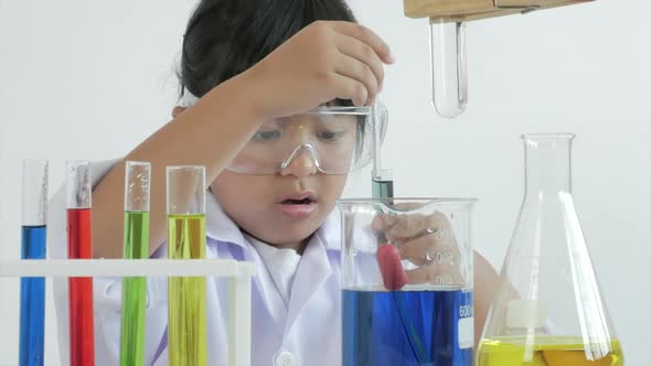 Children play and learn chemical in laboratory