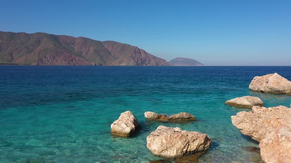 Coast Landscape with Mountains on Background alt
