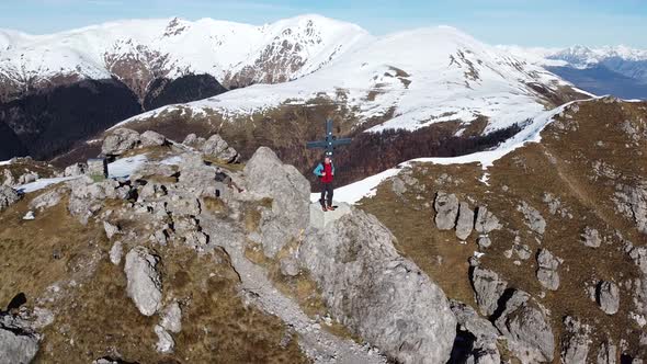 Flight around hikers on top of a mountain, European Alps, Como, Italy alt
