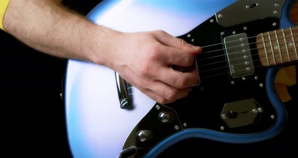 Male Guitarist Plug in Electric Guitar