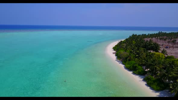 Aerial above sky of exotic coastline beach adventure by blue water and white sandy background of a d alt