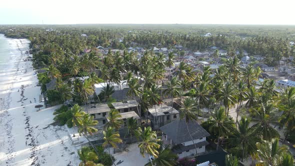 Aerial View of Houses Near the Coast in Zanzibar Tanzania Slow Motion alt