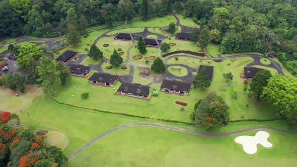 Luxury Golf Club in Tropical Mountains on the Island of Bali, Bedugul, Indonesia. Aerial Top View . alt