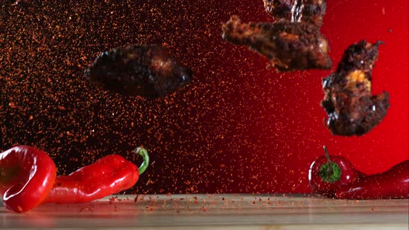 Smoked chicken wings falling and bouncing in ultra slow motion 1500fps - CHICKEN WINGS PHANTOM  alt