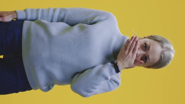 Woman Covering Her Eyes alt