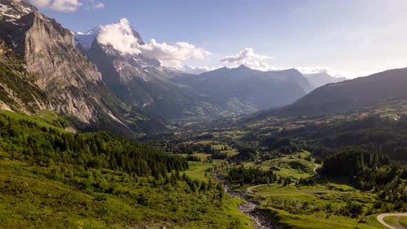 Hyperlapse of stunning mountainscape in Grindelwald in the Swiss Alps, flying towards Eiger North Fa alt