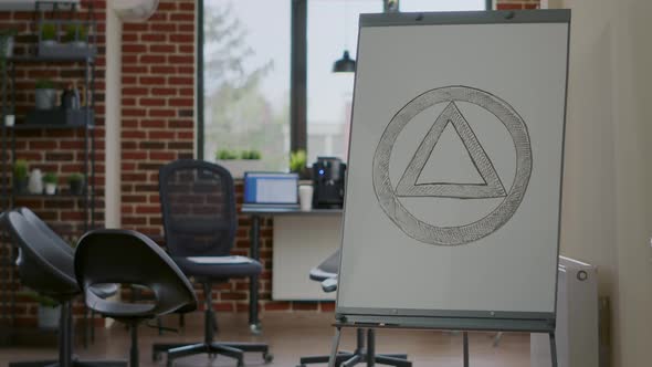 Close Up of Aa Meeting Symbol on White Board in Counseling Office alt