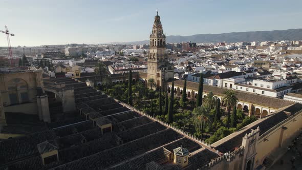 Drone pov of Islamic Mosque and Catholic Cathedral of Cordoba in Spain