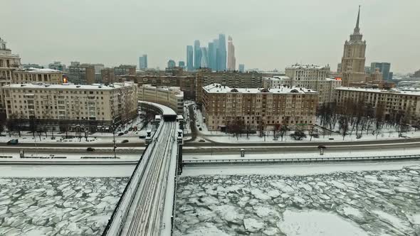 View of the Old Moscow in Winter Against the Backdrop of the Business Center alt