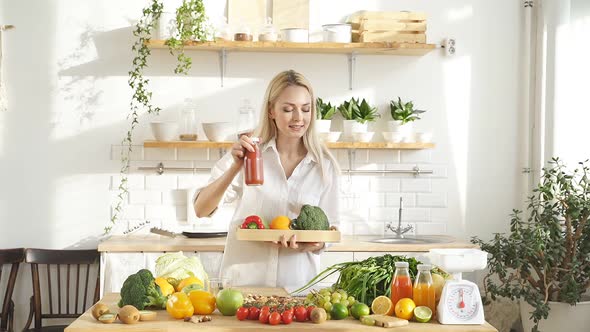 Beautiful Woman in Casual Clothes Enjoys a Healthy Diet She Chooses Vegetables and Fruits for alt