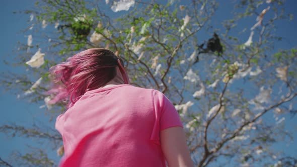 Save Earth Global Climate Warming  Woman at Tree Polluted By Plastic Bags alt