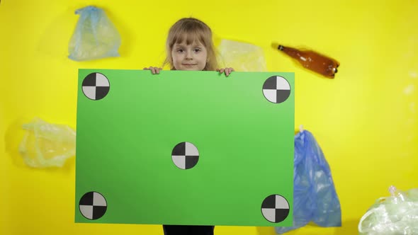 Girl Activist Holding Chroma Key Poster with Tracking Points. Environment Trash Plastic Pollution alt