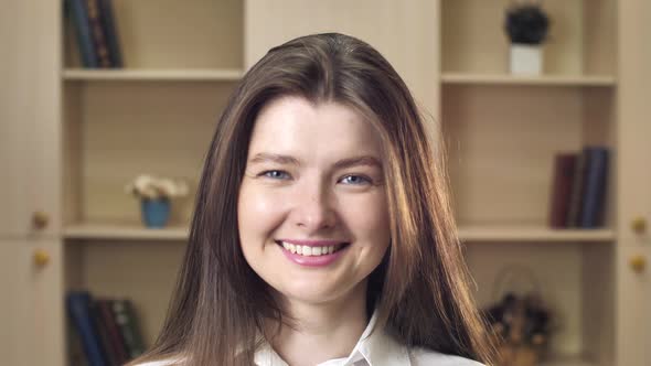 Beautiful Smiling Confident Young Woman Beautiful Face Looking at Camera Posing Alone at Home in alt