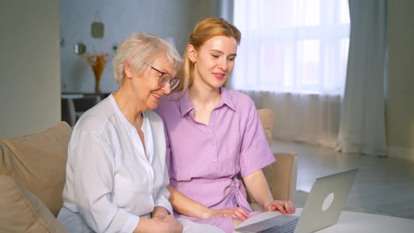 Smiling family talking to camera making conference video call alt