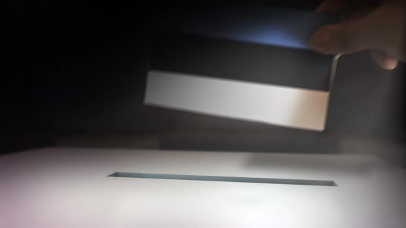 Estonia__election_box_hand.mov alt