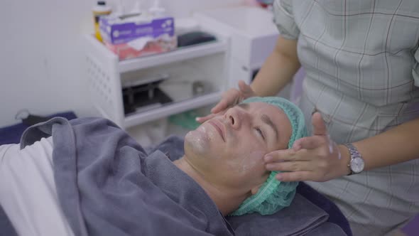 Close Up of Man Getting Aesthetic Procedure on Beauty Salon in Bangkok alt