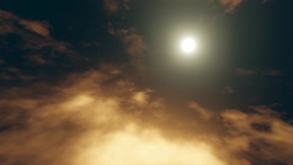 Gold Sun and Moving Clouds