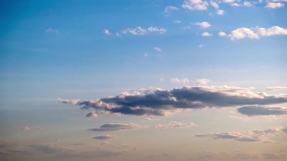 Clouds in the Blue Sky Slowly Move and Change Shape Timelapse alt