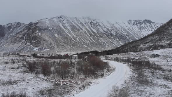 Electric installation in the middle of nowhere under the fog with a very frozen landscape.