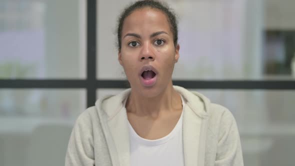 Portrait of African Woman Feeling Shocked alt