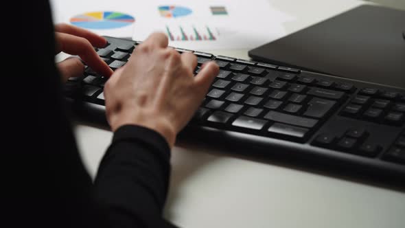 Close up woman hands typing on computer keyboard. alt
