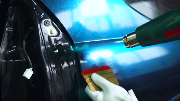 Worker at the Service Station is Further Processed Edge Vinyl Special Dryer alt