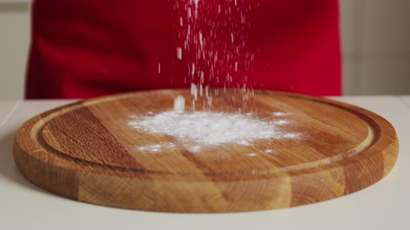 Slow Motion Flour Falls on the Board alt