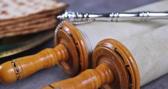 Passover Day Traditional Celebration with Kosher Matzah Unleavened Bread on Torah Scroll of Jewish alt