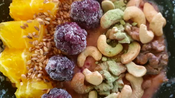 Healthy Vegan Bowl Smoothie With Fruits Berries Orange Cashew Nut Flax Seeds Kale Powder