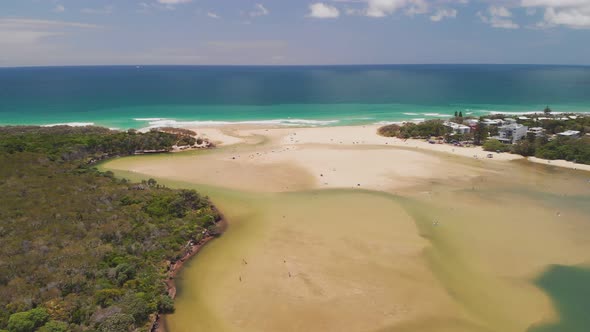 Aerial drone view of beach at Currimundi Lake, Caloundra, Sunshine Coast, Queensland, Australia