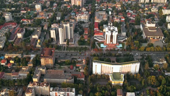 Aerial drone view of Chisinau downtown. Panorama view of multiple buildings, Parliament, Presidency, alt