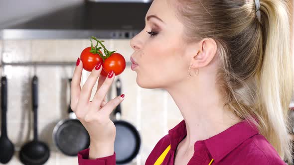 Woman Holds Cherry Tomatoes alt