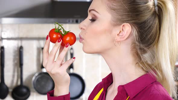 Woman Holds Cherry Tomatoes