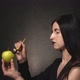 Girl Dyes an Apple - VideoHive Item for Sale