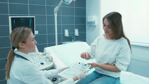 Joyous woman finishing medical examination