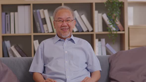 Healthy Asian Elderly man with white hairs smile and laughing so happiness and cheerful at home.Port alt