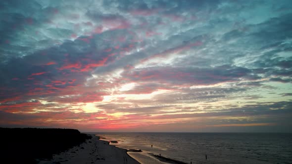 Aerial View Over the Kolka Cape, Baltic Sea, Latvia. During Autumn Evening Sunset alt